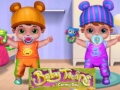 თამაშის Baby Twins Caring Day